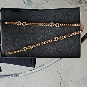 Gold chain womens necklace with faux diamond bows